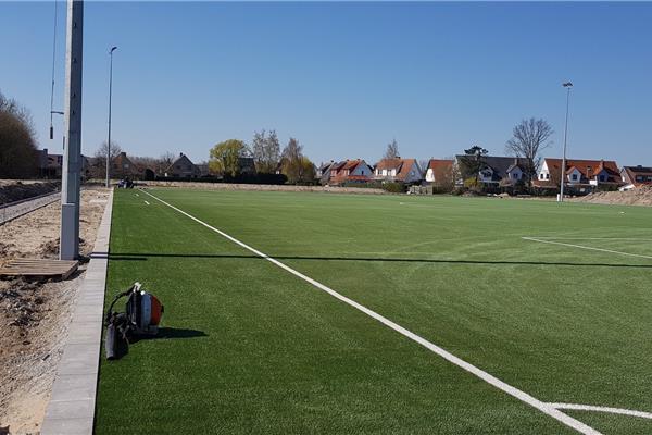 Aanleg sportpark met kunstgras voetbalveld, atletiekpiste, Finse piste en omgevingswerken - Sportinfrabouw NV